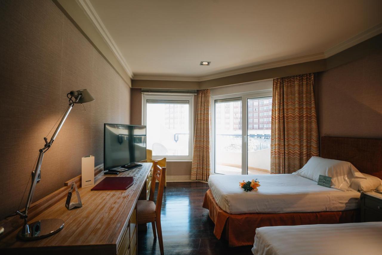Double or Twin Room with Side Sea View,1018529050:JPEG